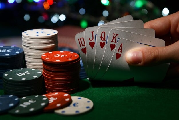 Mobile phone showing vivatogel live casino interface with dealer and betting controls